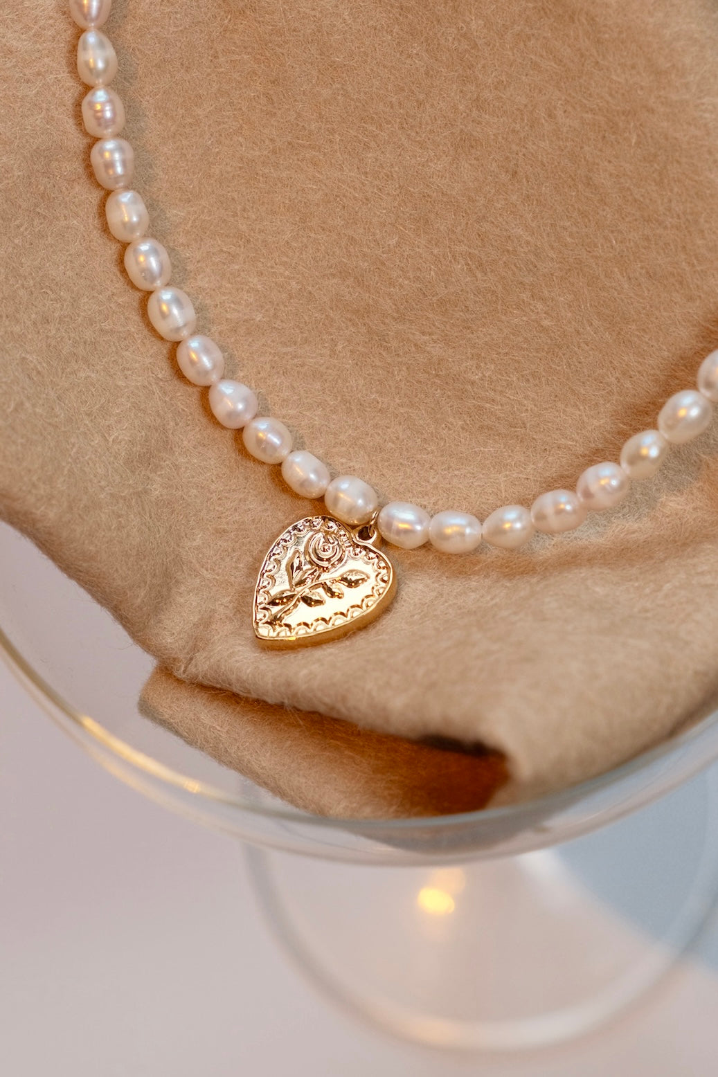 Vintage style heart pendant of a rose fresh water pearl necklace